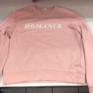 Pink “Romance” sweater